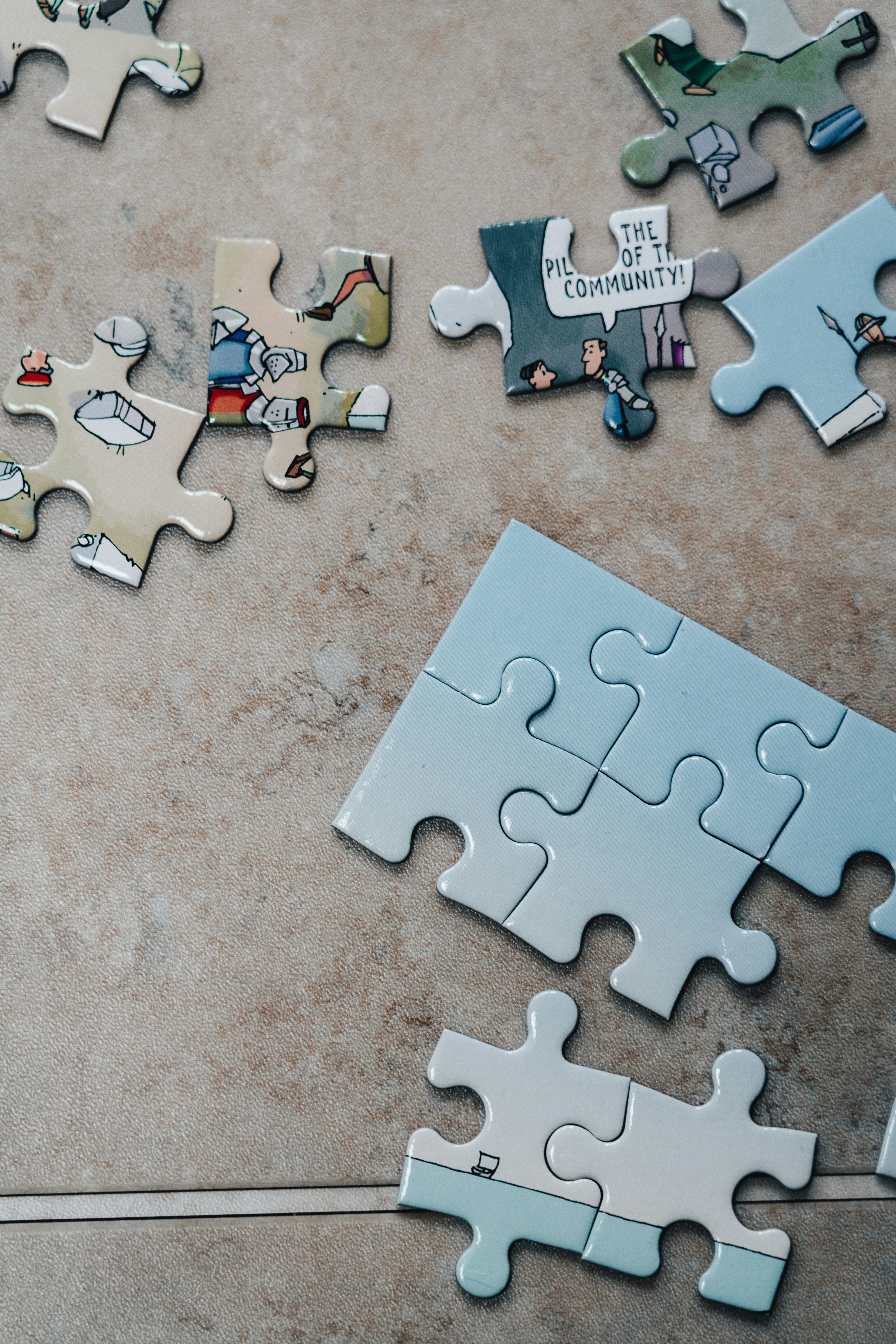 Puzzle pieces representing collaboration between teams for organized test data management